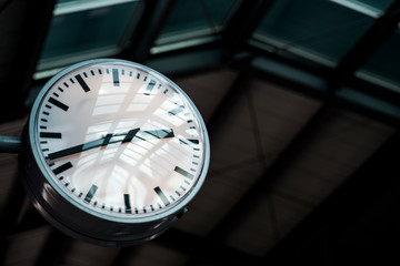 Clock in railway station .