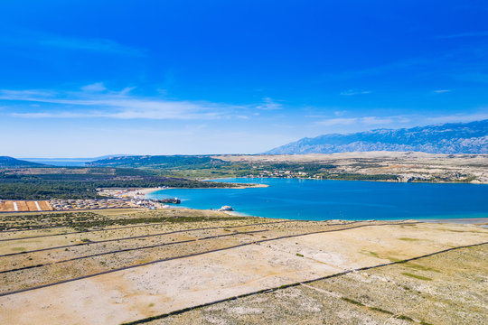 Croatia, aerial view of the beautiful Zrce beach and old dry walls on Pag island on Adriatic sea