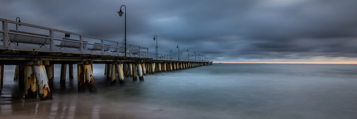 Obraz premium stormy sunrise over the baltic sea in Gdynia Orlowo, Poland