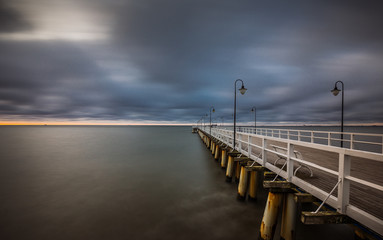 Fototapeta premium stormy sunrise over the baltic sea in Gdynia Orlowo, Poland