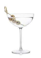 Vodka martini gin cocktail in luxury crystal glass with olives on bamboo stick on white background with reflection.