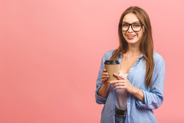 Fototapeta na wymiar Image of happy young business woman posing isolated over pink wall background.