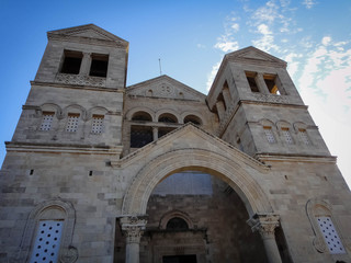 Fototapeta premium Holy Mary, child Jesus and Saint Joseph at the entrance of Saint Joseph in Nazareth, Israel