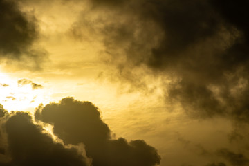 Incredible storm clouds covering the sun. Meteorological phenomenon that causes rain.