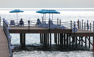 sea wooden pier in the resort