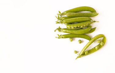Fresh green peas on a white background. Natural, organic food. Copy space