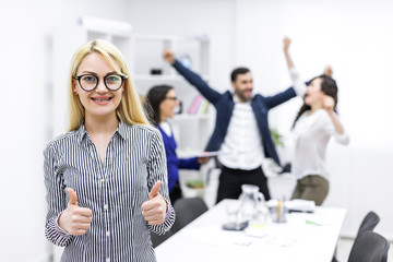 Successful team of business people in the office.