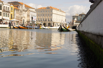River with gondolas in front of colorful houses in Aveiro