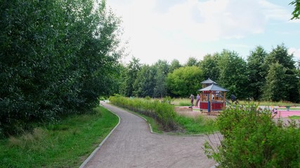 Amazing and relaxing path in the park. Surrounded by trees