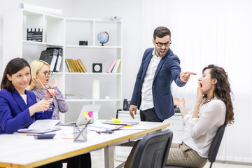 Meeting of young business people in a modern office.