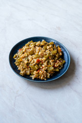 Turkish Olive Oil Food Green Peas / Fasulye Diblesi or Ayse Kadin Dible with Bulgur / Bulghur Rice served in Plate