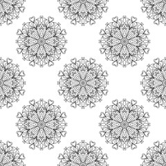 Fantasy seamless pattern with ornamental mandala. Abstract round doodle flower background. Floral geometric circle. Vector illustration.   