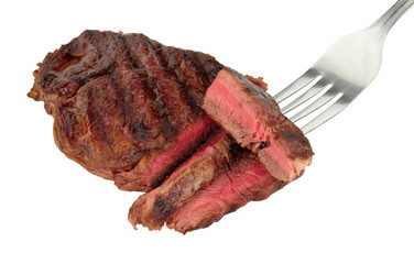 Rare cooked juicy fillet beef steak isolated on a white background