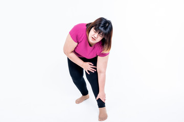 Fototapeta na wymiar Portrait images of Asian attractive fat woman has an ankle injury, Due to obesity And has a large body weight, On white background, to people and health care concept.
