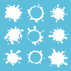 Set of milk blots and splashes. Fresh milk diary products symbols. Best for logo and packaging design. White vector splashes isolated on light blue background.