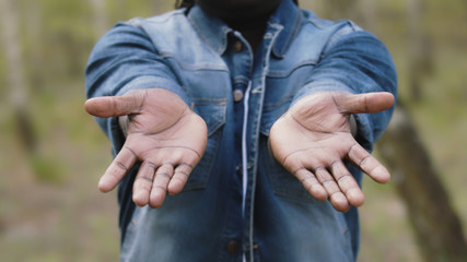 African man showing the palm of his hands. Black lives matter. High quality photo