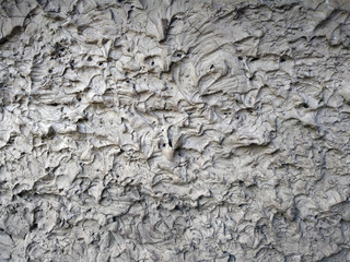 Surface texture of hardened concrete, not leveled, with large irregularities