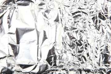 Scrunched shiny aluminum foil surface
