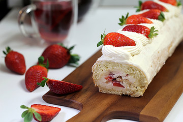 Biscuit roll with cream and strawberry