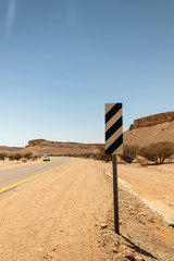 Fototapeta na wymiar road sign in desert