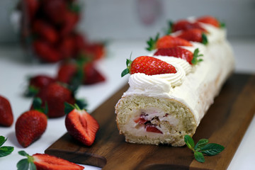 Biscuit roll with cream and strawberry