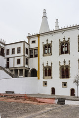 Architectural fragment of National Palace of Sintra (also known as the "Town Palace" or Palacio Nacional de Sintra, XI century), now historic museum. Sintra, Portugal.