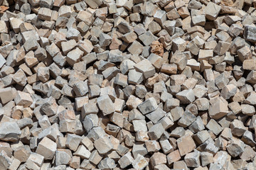 pattern of granite cobble stones at a heap