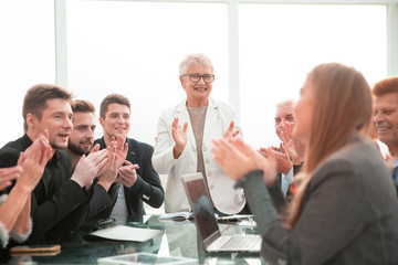 Success group of business people with clapping hands at office.