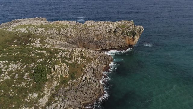 Asturias. Cuevas del Mar.  Cliffs and beach. Spain