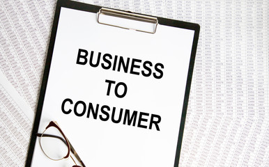 Business concept. On the table is a calculator, diary, markers, pencils and a notebook with the...