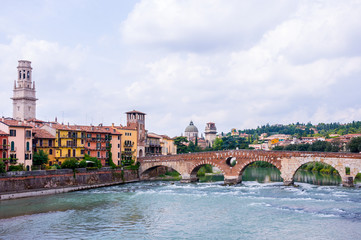 Obraz premium Verona Cathedral and Ancient Roman Bridge called Ponte di Pietra on Adige River in Verona, Northern Italy.