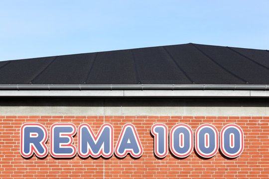 Aarhus, Denmark - November 8, 2015: Rema 1000 logo on a facade. Rema 1000 mainly operates in Norway and Denmark