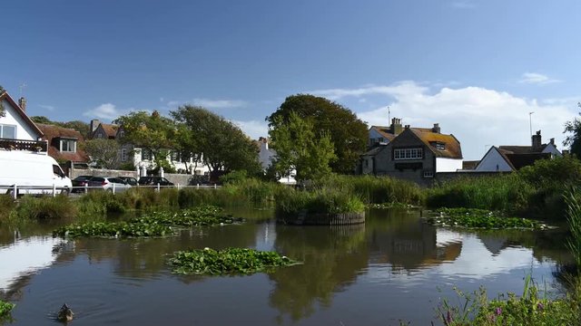 Time Lapse of a traditional English Village pond in the center of the coastal village of Rottingdean near Brighton.