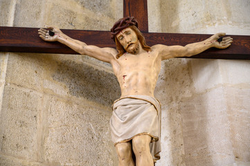 Sculpture of Jesus Christ on the cross. St Martin's Cathedral in Bratislava. Bratislava, Slovakia. 2020/05/20.