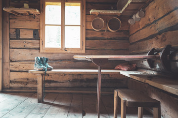 Abandoned mountain hut or chalet in Austria: rustic wooden interior