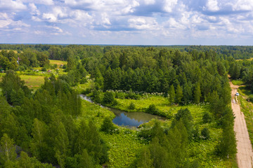 Fototapeta na wymiar A small river Shakhmakhta near the village of Rogatino, Ivanovo region on a summer day.