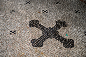 Mosaic of a cross on the floor in a church. St Martin's Cathedral in Bratislava, Slovakia. 2020/05/20.