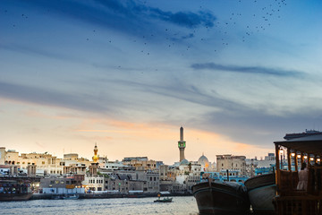 Dubai Creek / Bur Dubai with traditional boats called 'Abra' docked in the port.