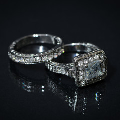 2 beautiful white diamond wedding rings for lovers to give to each other.