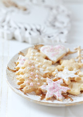 Homemade Christmas cookies on bright background.	