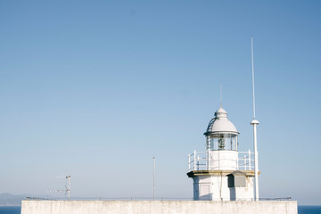 Fototapeta na wymiar Lighthouse by daylight in Portofino