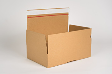 Brown mailer box 300x200x80 on the white background