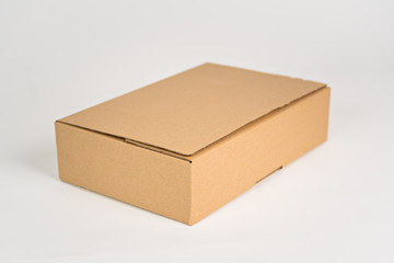 Brown mailer box 300x200x80 on the white background
