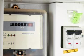 energy meter and electricity switch box indoors. repair and adjust domestic power wires and...