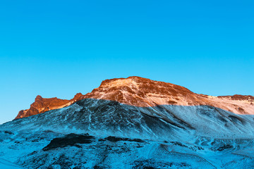 Iceland's incredible mountain landscape in winter. Mountains in the snow. Large spaces. The beauty of winter nature