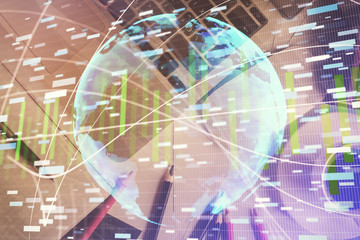 Business theme hologram drawings over computer on the desktop background. Top view. Multi exposure. Concept of international connections.