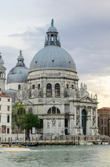 Basilica of Santa Maria della Salute ( Basilica di Santa Maria della Salute).Spectacular domed baroque church with unique octagonal design & sacristy housing 12 works by Titian.Venice,Italy