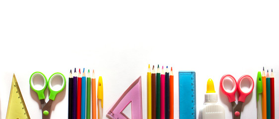 Back to school background concept. School supplies on a white background. Banner. copyspace