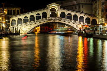 Fototapeta na wymiar Night view of Rialto Bridge (Ponte di Rialto) . Venice, Italy