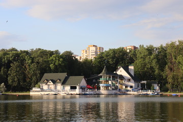 Fototapeta na wymiar boat station in Minsk with building and pier